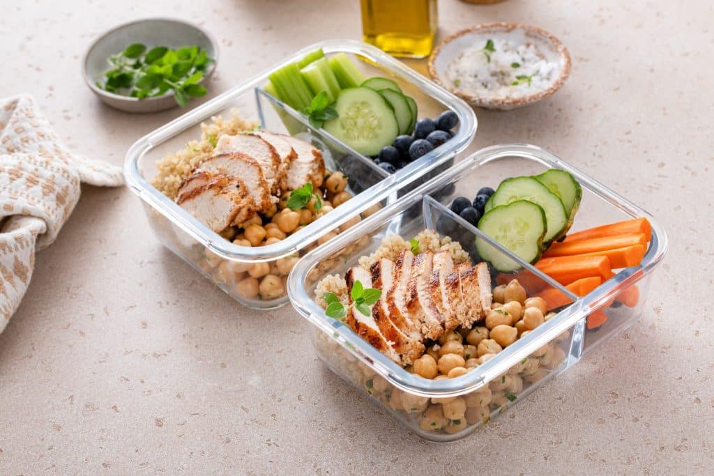 Meal prep containers showing healthy eating in budget fitness tips