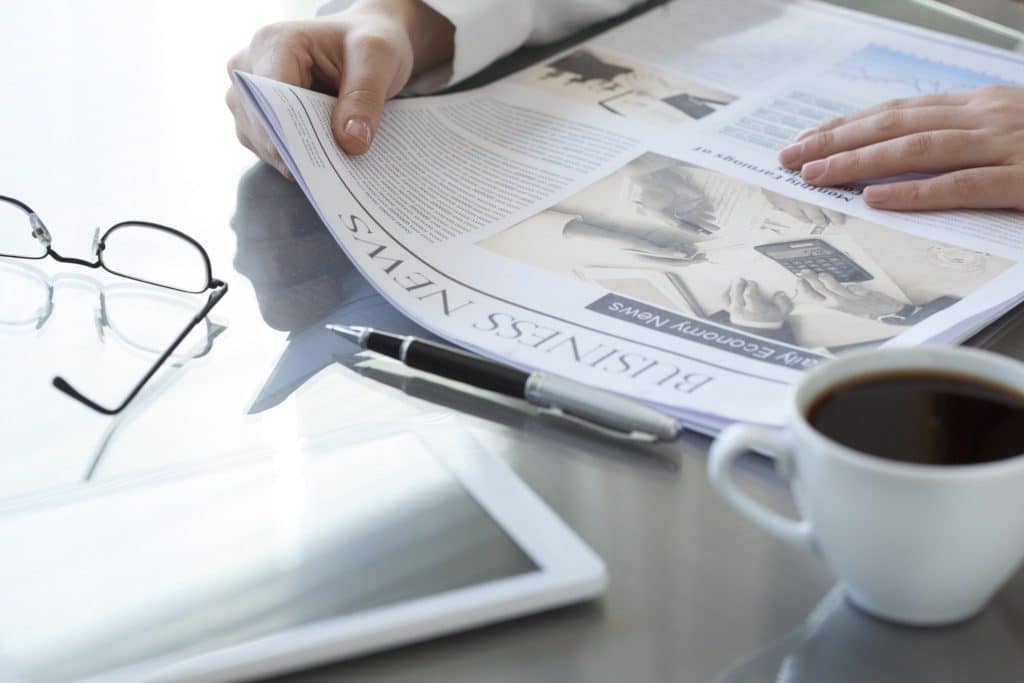Daily financial habits of reading financial news in the morning.