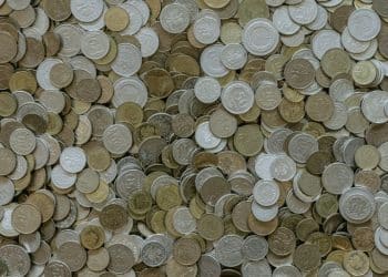 round silver-and-gold-colored coin collection