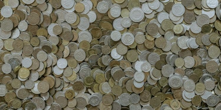 round silver-and-gold-colored coin collection